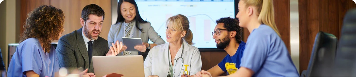 Neolytix team discussing data analytics and AI-driven business solutions in a collaborative meeting